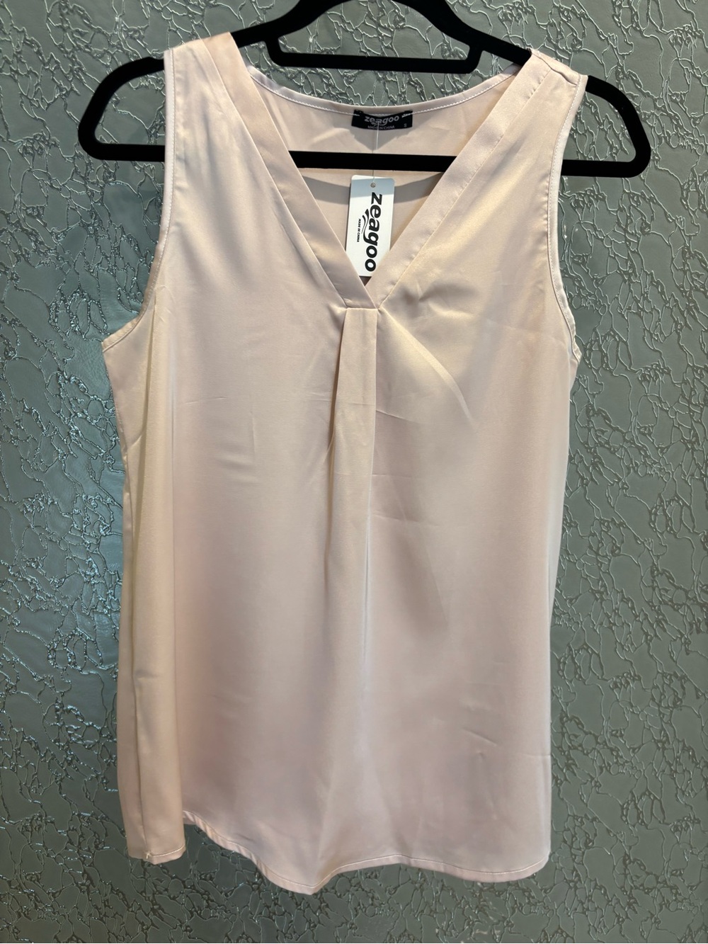 Zegroo Light Pink V-Neck Sleeveless Blouse